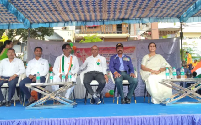 Chief guest and school management seated on the decorated dais for the Independence Day function